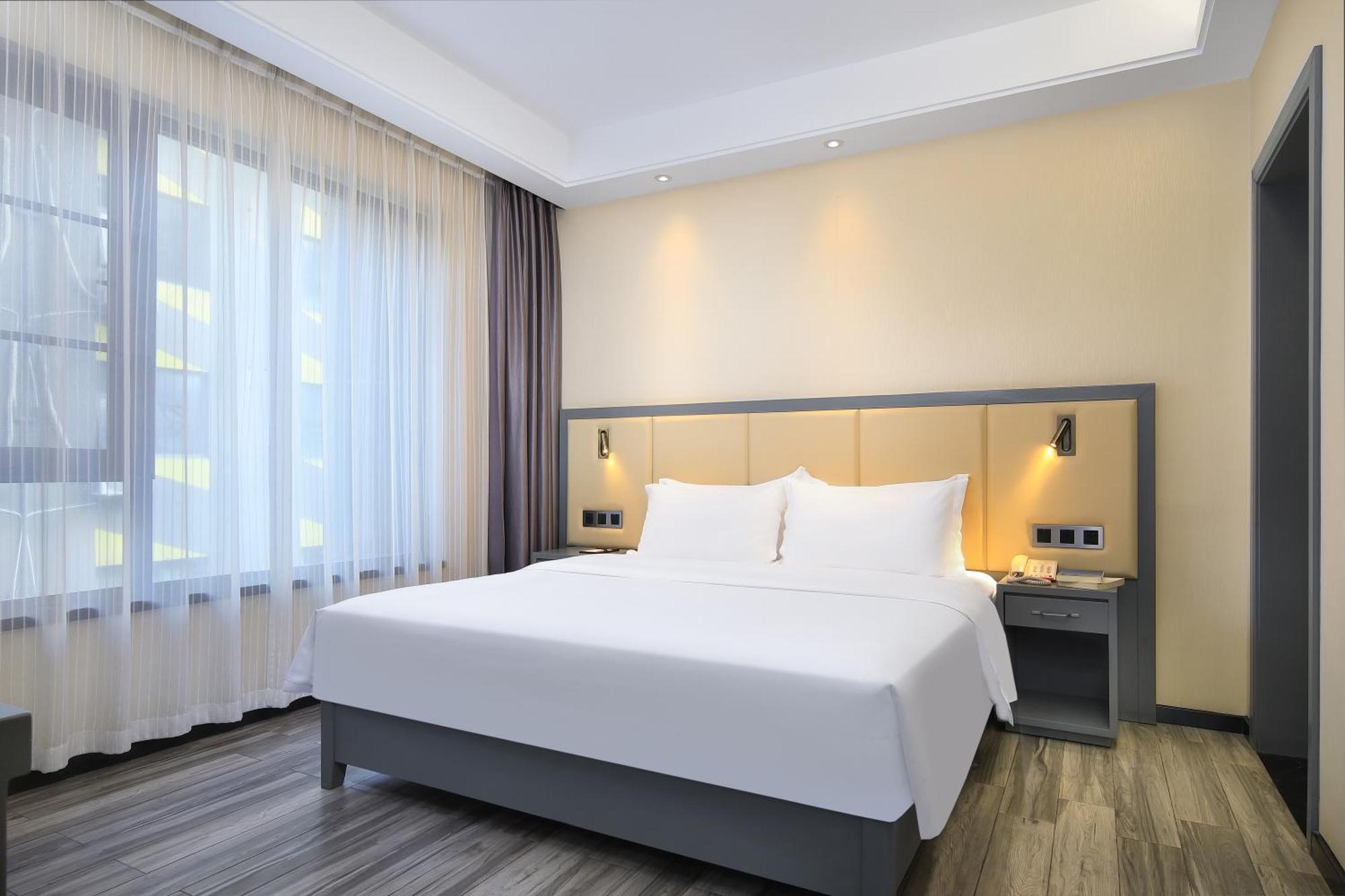 Wing Hotel Guilin - Central Square Quarto foto