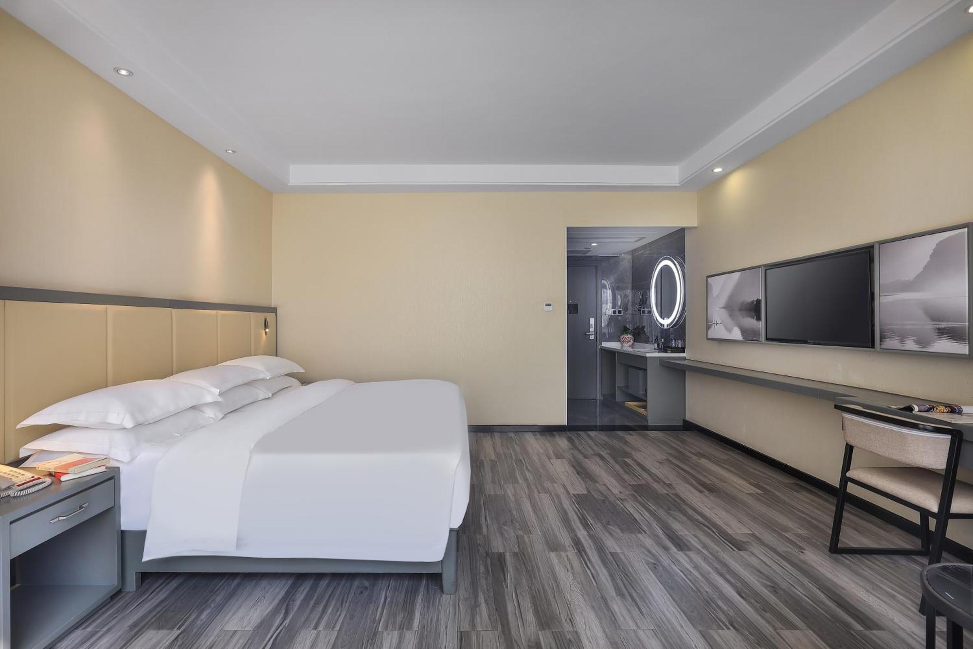 Wing Hotel Guilin - Central Square Quarto foto