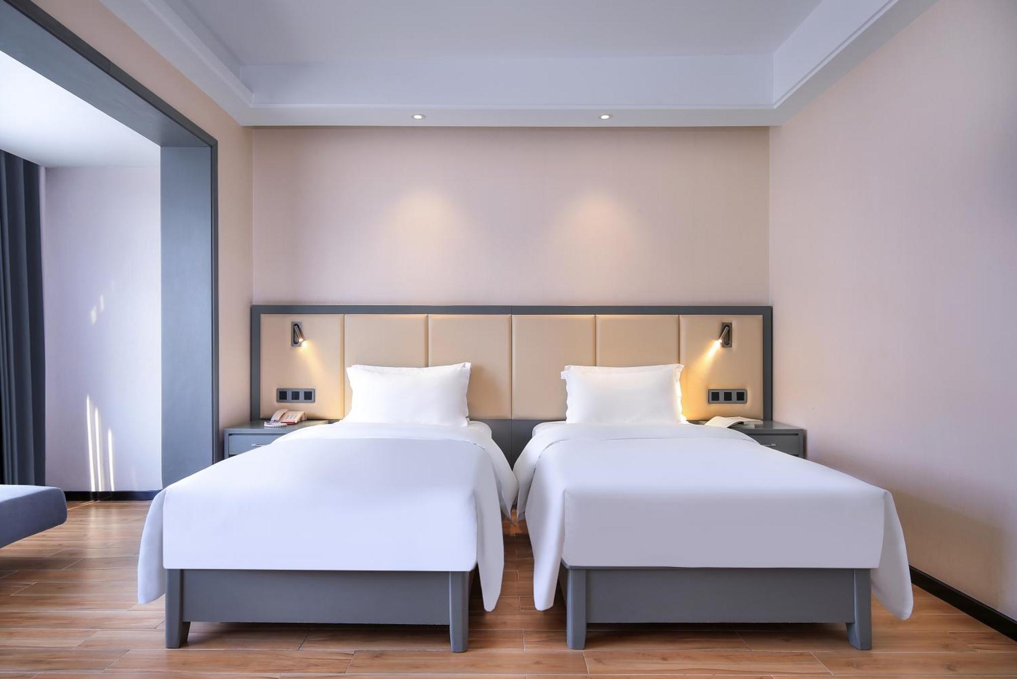 Wing Hotel Guilin - Central Square Quarto foto