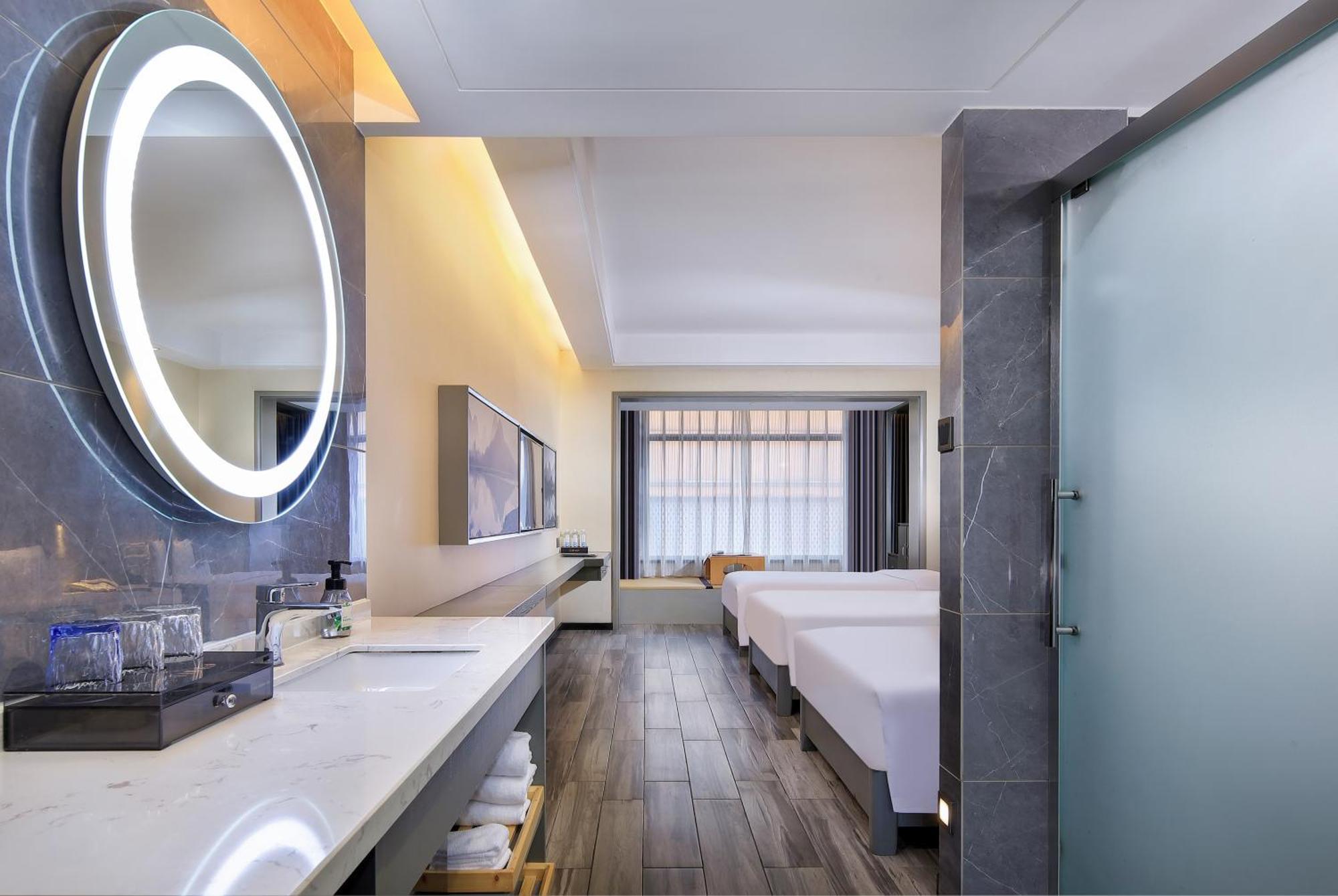 Wing Hotel Guilin - Central Square Quarto foto